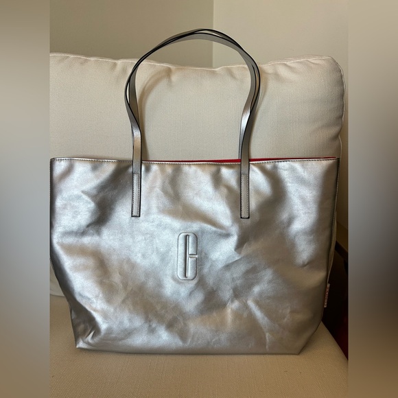 Clinique Handbags - Clinique Metallic Silver and Red Reversible Tote Handbag